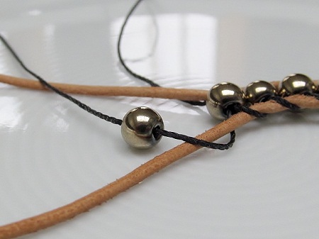 wrap bracelet in ladder stitch - preparing to attach the next bead